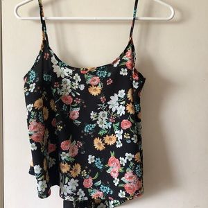 A breezy loose fit blouse with a low back